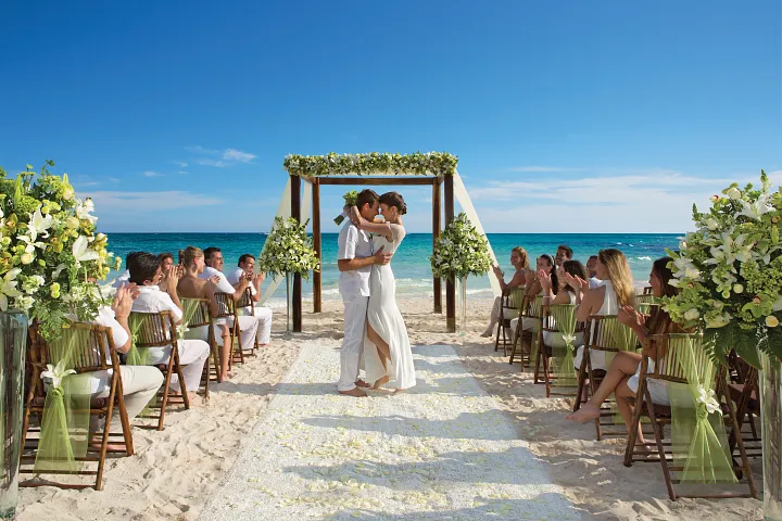 Couple celebrating a destination wedding at an all-inclusive resort